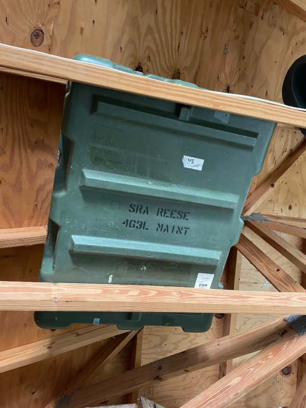 Foot locker/Storage Box. Military? 64x11x13 Metal hinges, edges and clip  on front. Yellow marking on top and yellow letter on end. Can't identify  the markings. : r/whatisthisthing